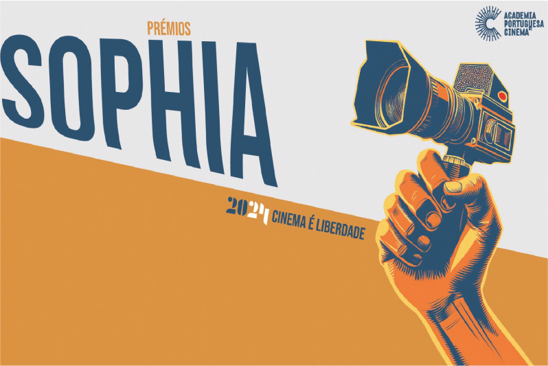 mão a segurar câmara de cinema